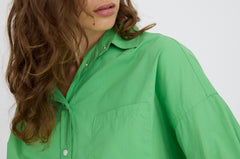 Light verde green cotton button-up shirt with relaxed fit and drop shoulders