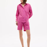 Chiara oversized striped shirt in fuchsia, true red, and natural with drop shoulders and chest pocket