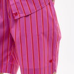 Chiara Oversized striped shirt in fuchsia, true red, and natural stripes with relaxed fit and chest pocket