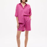 Chiara Oversized Striped Shirt in fuchsia, true red, and natural with relaxed silhouette and chest pocket