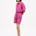 Chiara Oversized Striped Shirt in Fuchsia, True Red, and Natural with relaxed fit and chest pocket