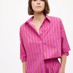 Chiara oversized striped shirt in fuchsia, true red, and natural with drop shoulders and chest pocket