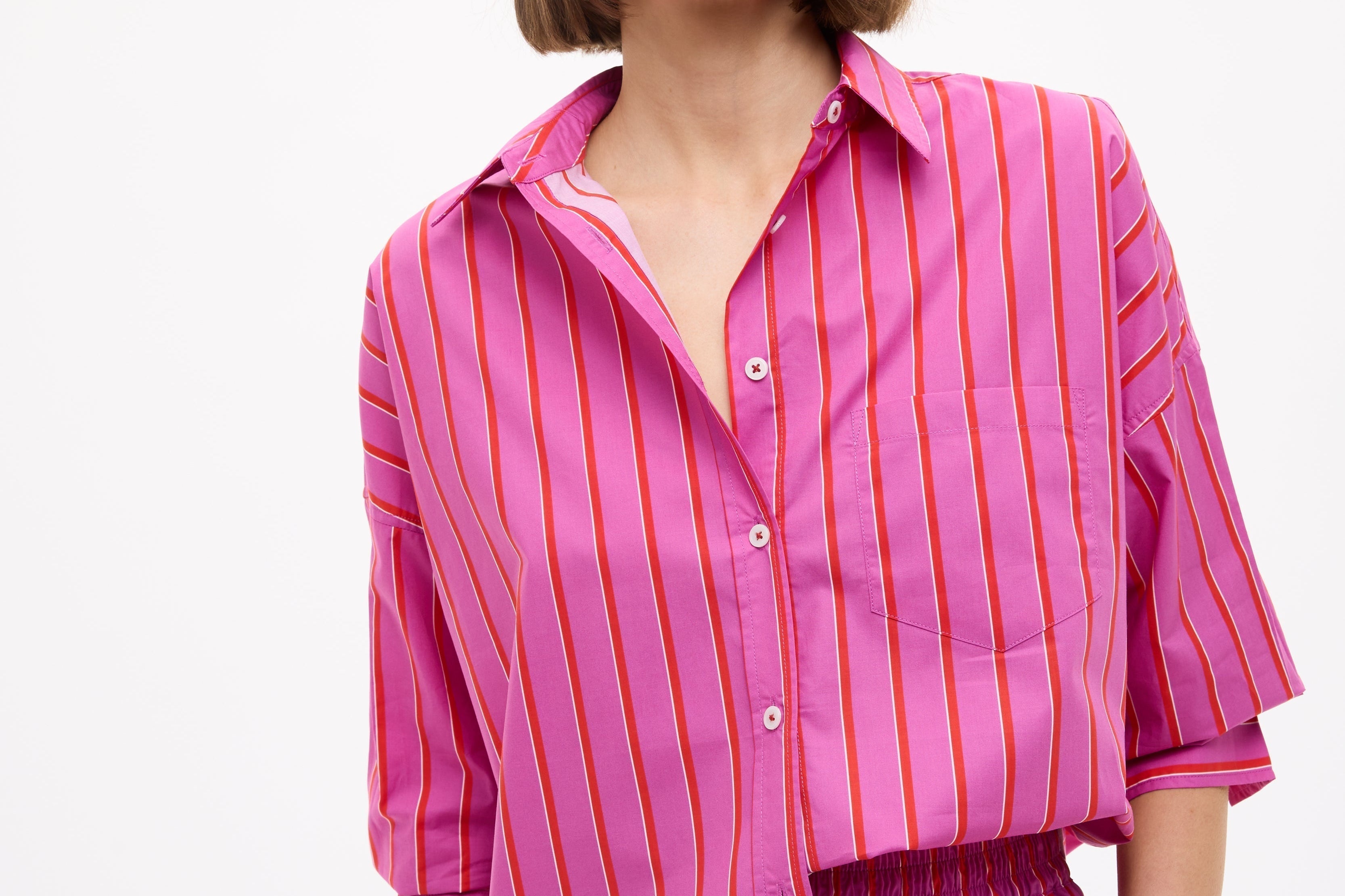 Chiara oversized striped shirt in fuchsia, true red, and natural with drop shoulders and chest pocket