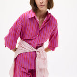 Chiara Oversized striped shirt in fuchsia, true red, and natural stripes with drop shoulders and chest pocket