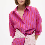 Chiara Oversized striped shirt in fuchsia, true red, and natural stripes with relaxed fit and chest pocket
