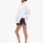Oversized Classic White Shirt in crisp white cotton with long sleeves and relaxed fit