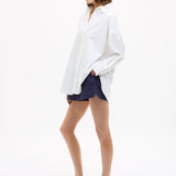 Oversized Classic White Shirt in crisp white cotton with long sleeves and relaxed fit