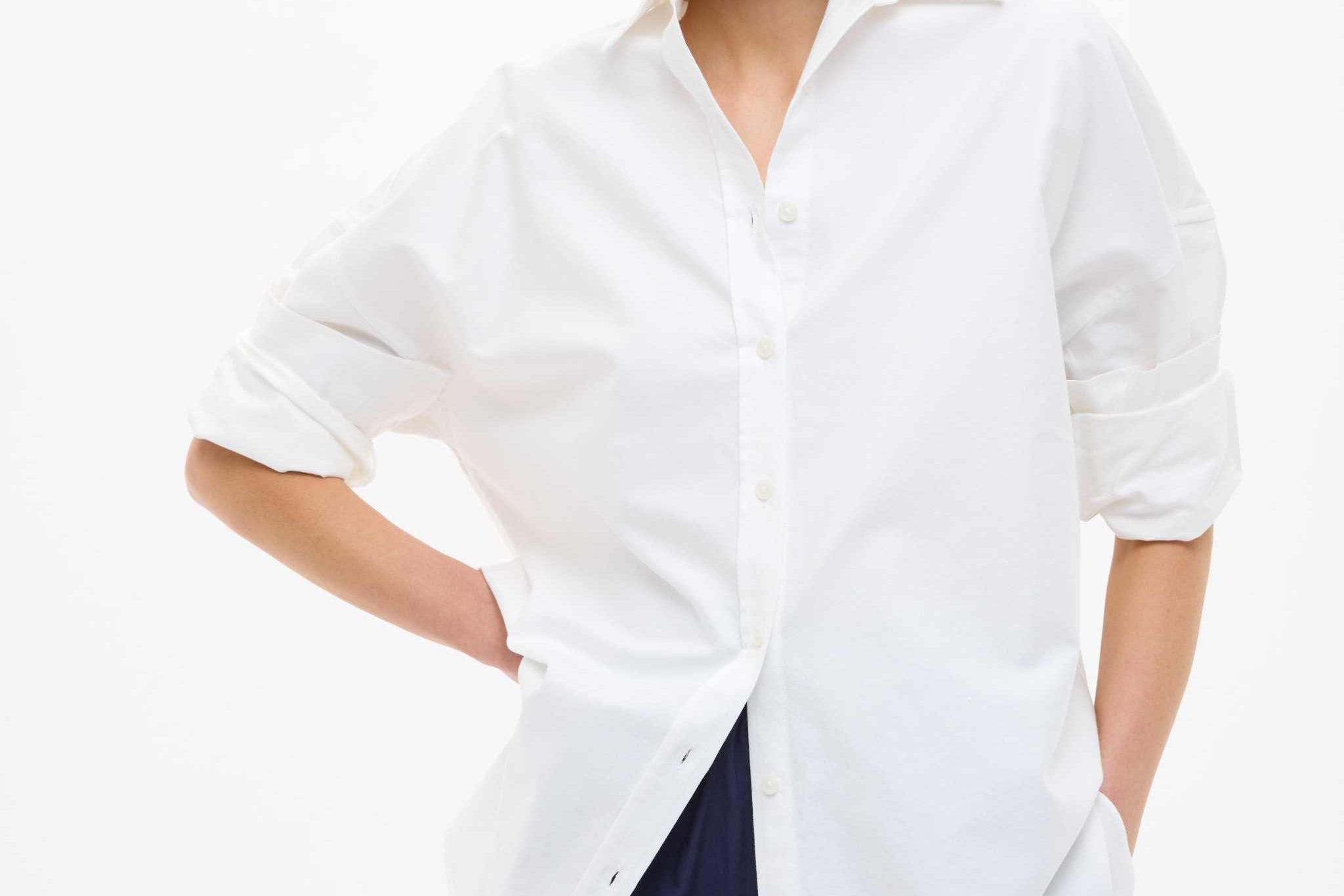 White oversized classic long sleeve cotton shirt with structured fit and clean design