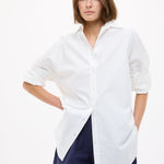 White oversized classic long sleeve cotton shirt with structured fit and clean design