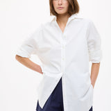 White oversized classic long sleeve cotton shirt with structured fit and clean design