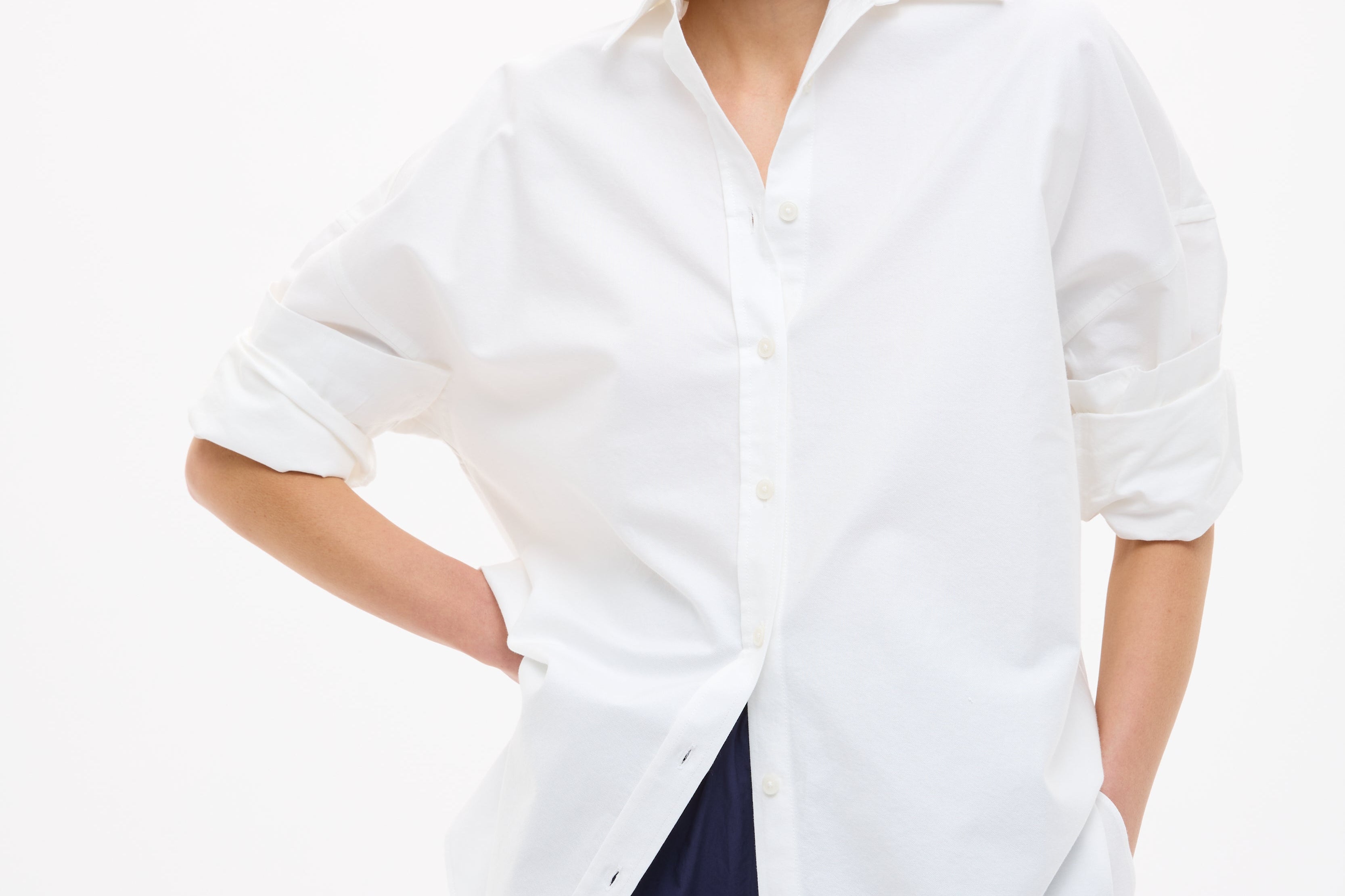 White oversized classic long sleeve cotton shirt with structured fit and clean design