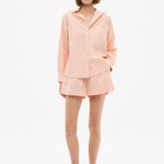 Model wearing Chiara Long Sleeve Cotton Shirt with custom stripe and chest pocket in relaxed fit