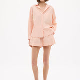 Model wearing Chiara Long Sleeve Cotton Shirt with custom stripe and chest pocket in relaxed fit