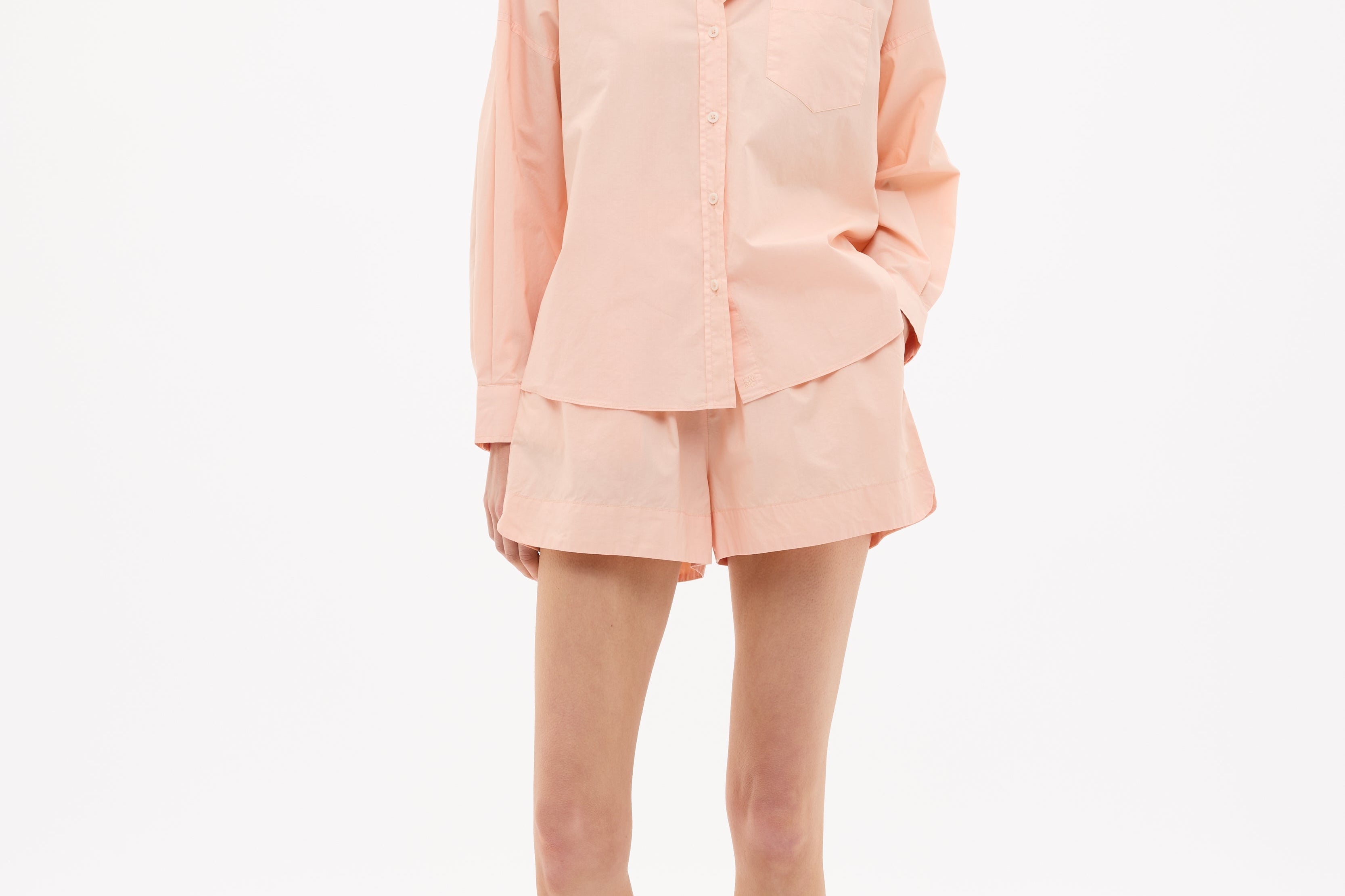Model wearing Chiara Long Sleeve Cotton Shirt with custom stripe and chest pocket in relaxed fit