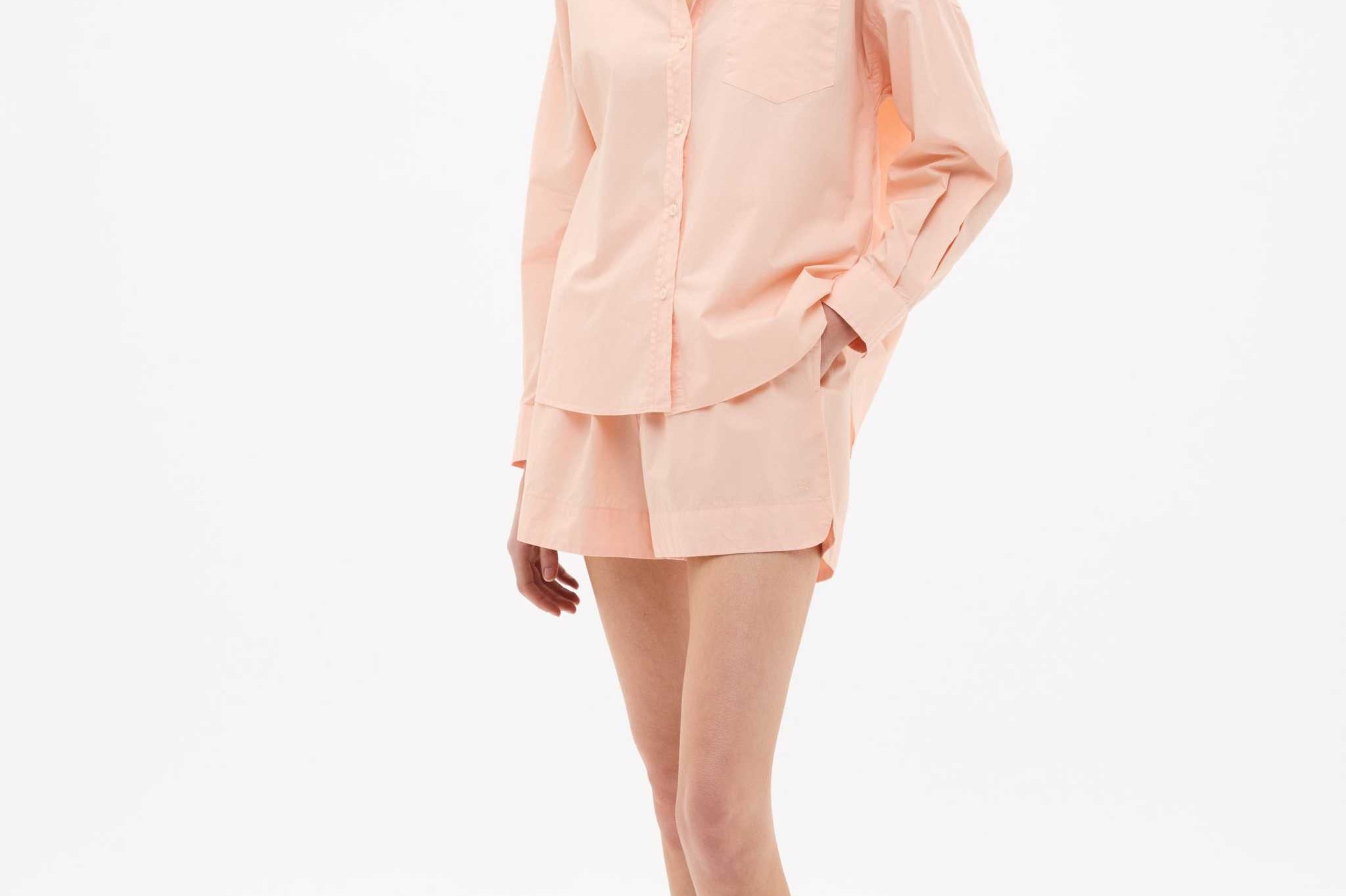Model wearing Chiara Long Sleeve Cotton Shirt with custom yarn-dyed stripes and relaxed fit at Spanish Villa