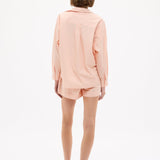Model wearing Chiara Long Sleeve Cotton Shirt in Spanish Villa with relaxed fit and chest pocket