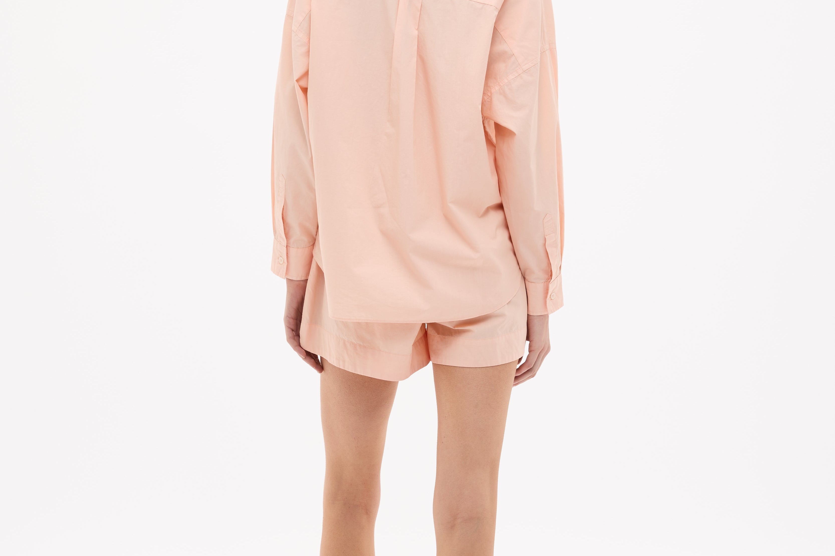 Model wearing Chiara Long Sleeve Cotton Shirt in Spanish Villa with relaxed fit and chest pocket