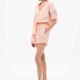 Model wearing Chiara Long Sleeve Cotton Shirt with custom stripe and chest pocket in relaxed fit