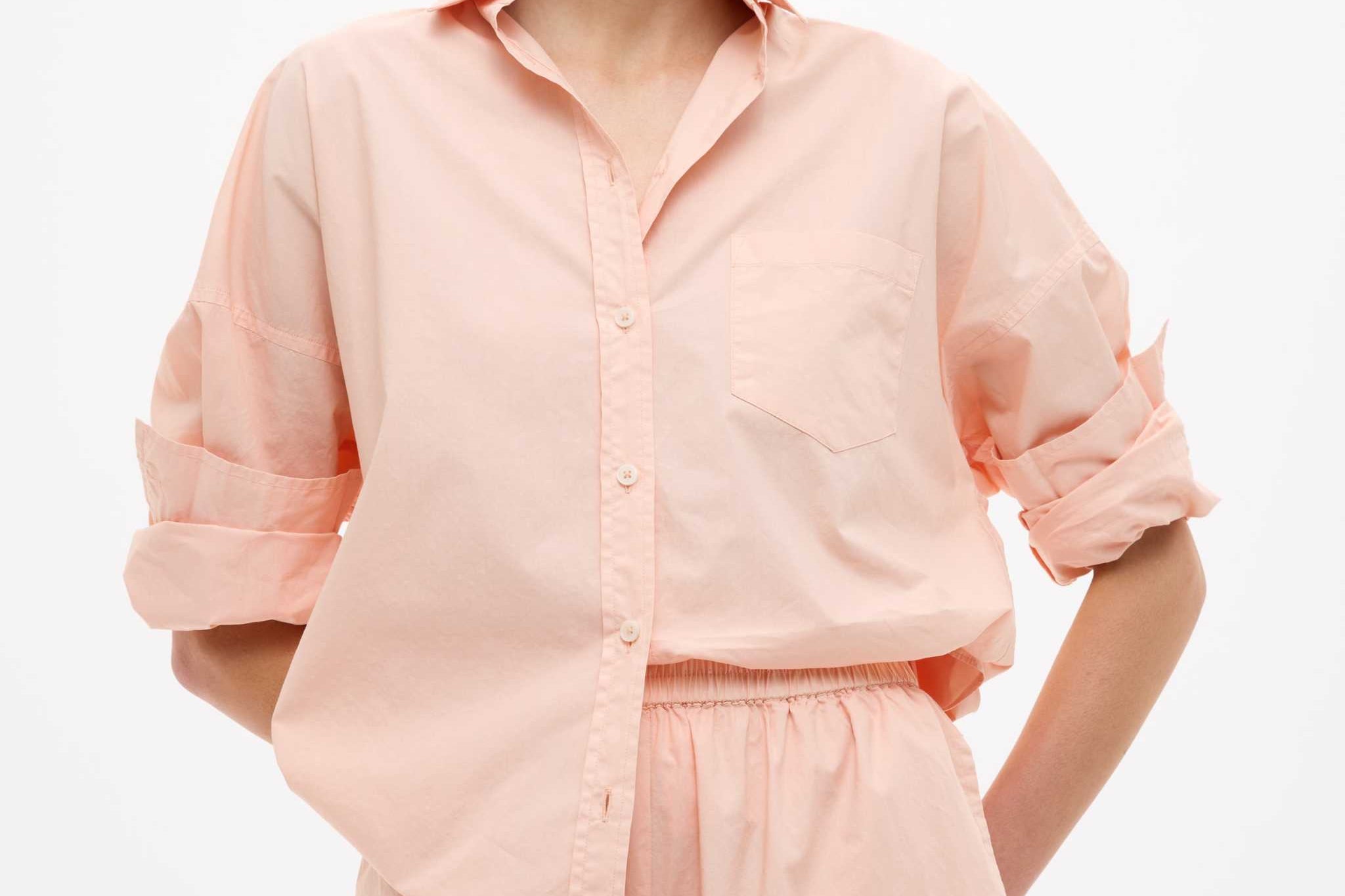 Model wearing Chiara Long Sleeve Cotton Shirt in Spanish Villa with custom stripe and drop shoulders