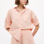 Model wearing Chiara Long Sleeve Cotton Shirt in Spanish Villa with custom stripe and drop shoulders