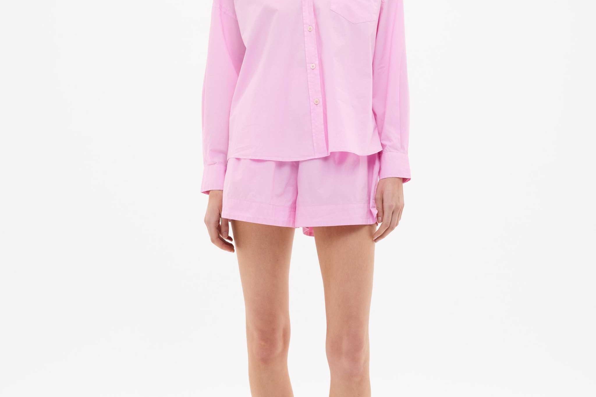 Women wearing Rose Glow oversized cotton button-up shirt with chest pocket and drop shoulders