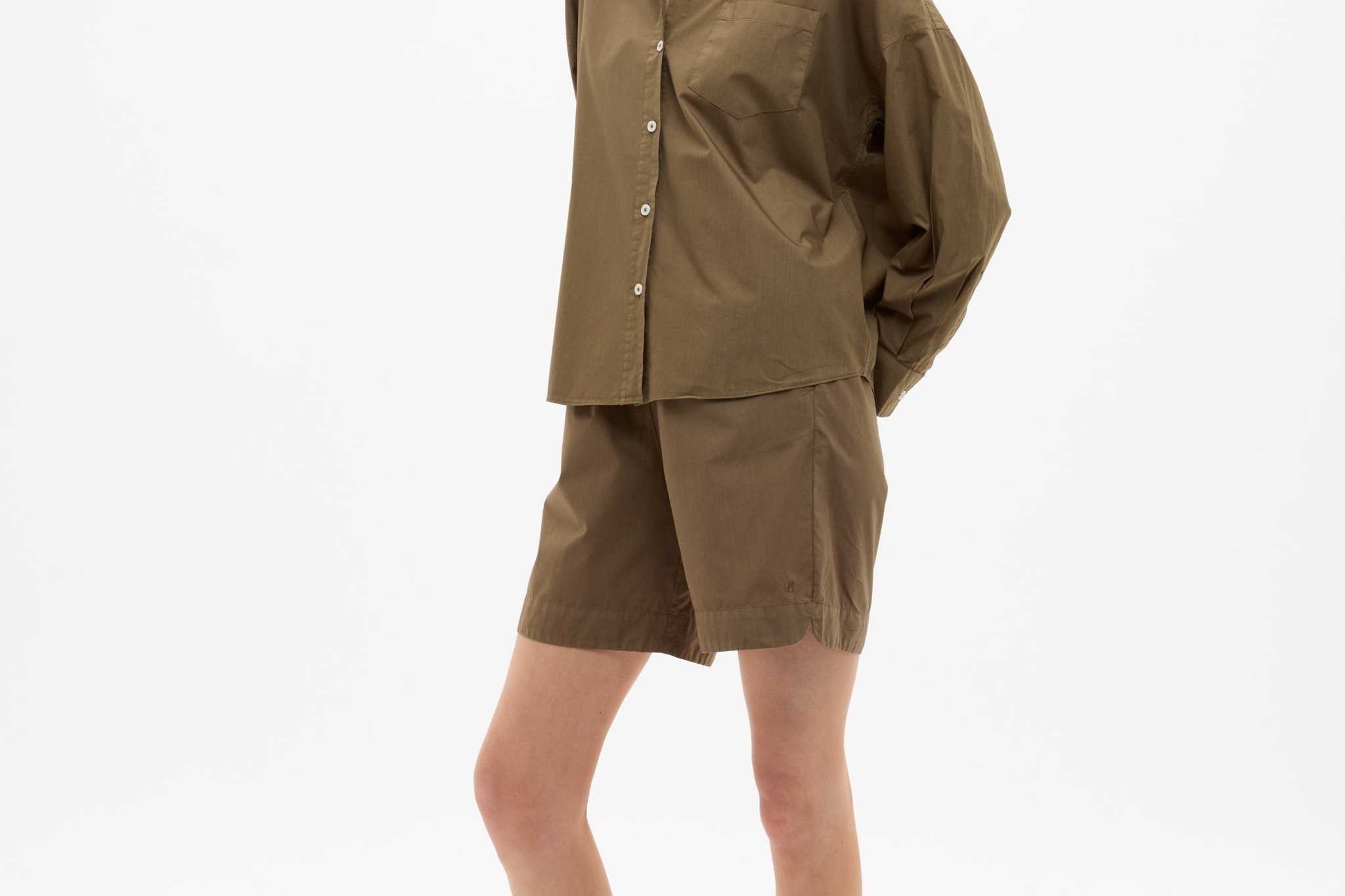 Dark olive Classic Long Sleeve Shirt with custom stripe, chest pocket, and drop shoulders in relaxed fit.