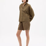 Dark olive Classic Long Sleeve Shirt with custom stripe, chest pocket, and drop shoulders in relaxed fit.