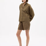 Dark olive Classic Long Sleeve Shirt with custom stripe, chest pocket, and drop shoulders in relaxed fit.