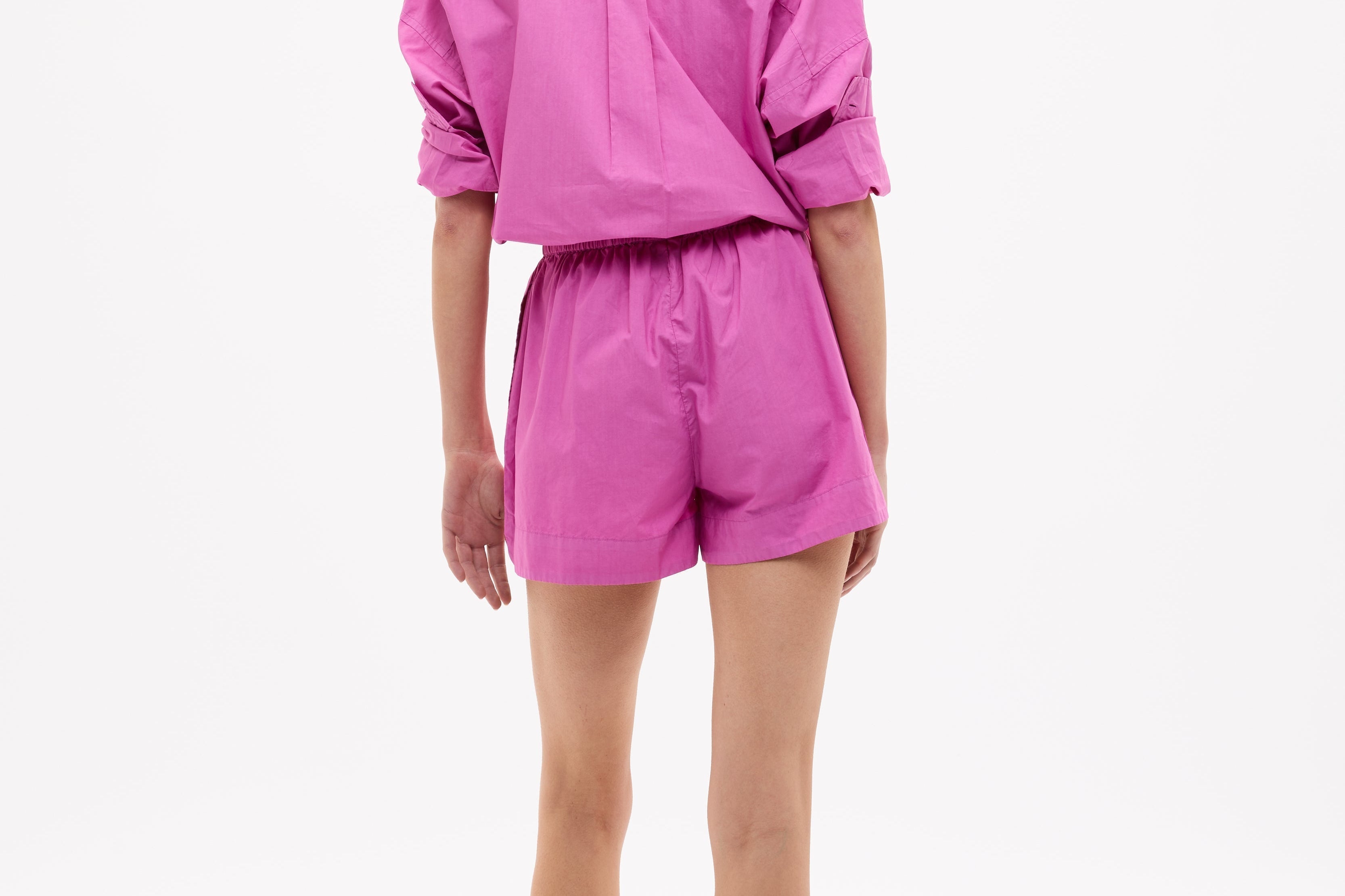 Chiara Cotton Long Sleeve Shirt in fuchsia, classic button-up with custom stripe, chest pocket, drop shoulders, and relaxed fit.