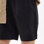Black mid length cotton shorts with relaxed fit and elastic waistband