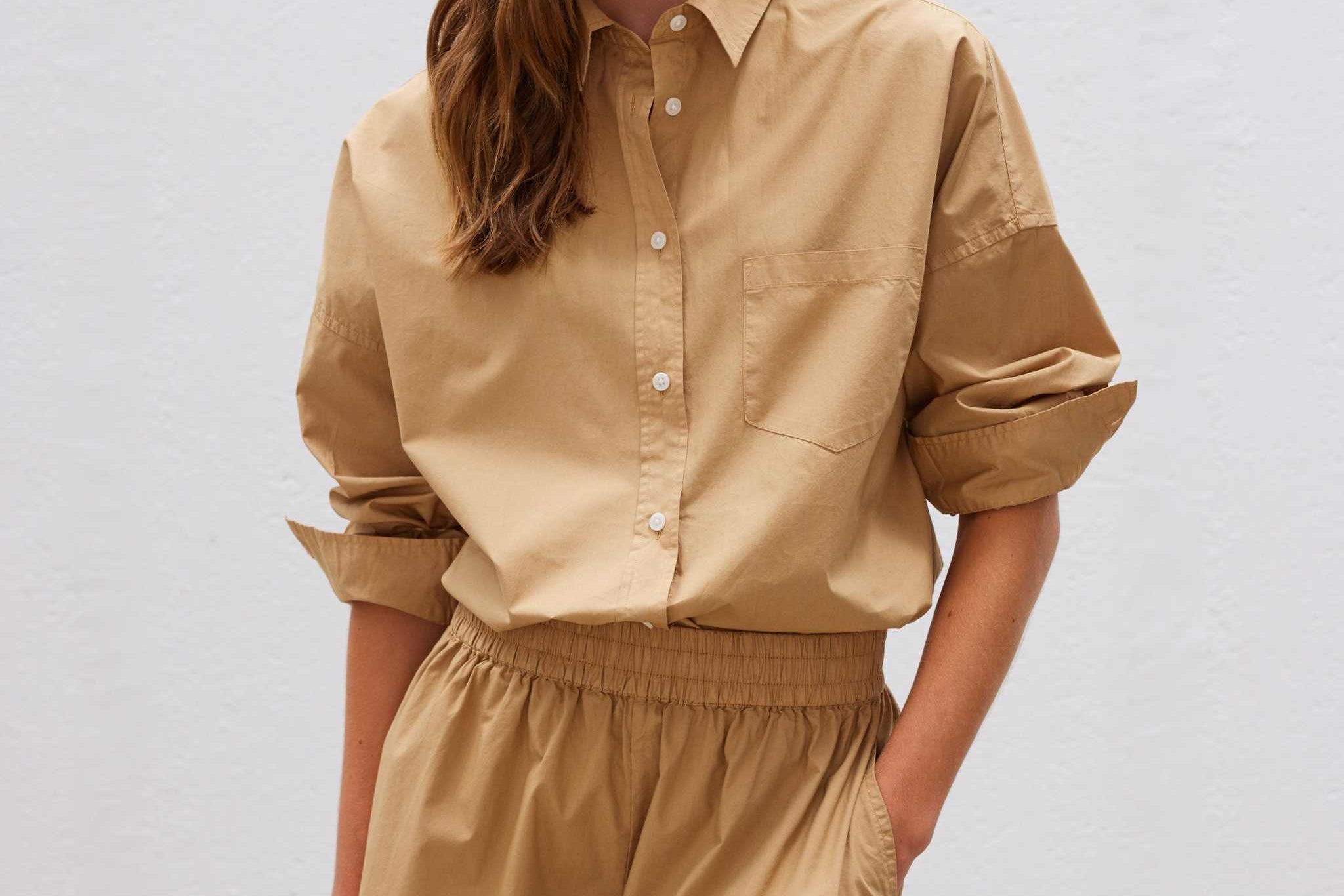 Woman wearing toffee-colored Chiara Long Sleeve Shirt with matching shorts in relaxed fit